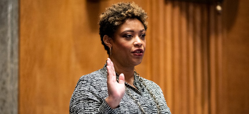 Acting OMB DIrector Shalanda Young prepares is sworn in to testify before a Senate committee, Feb. 1, 2022