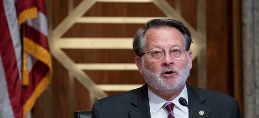Sen. Gary Peters (D-Mich) chairs a Senate hearing in May 2021.