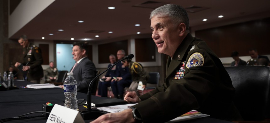 Gen. Paul Nakasone, Cyber Command head and Director of the National Security Agency , prepares to testify at a Senate hearing, April 5, 2022