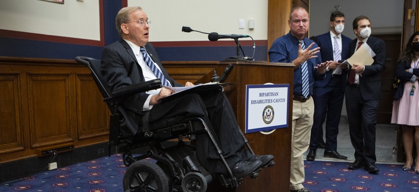 WASHINGTON, DC - JULY 26: Rep. Jim Langevin (D-RI), founder and co-chair of the Bipartisan Disabilities Caucus, speaks to an attendee at a reception to celebrate the 32nd anniversary of the passing of the Americans With Disabilities Act on July 26, 2022 in Washington, DC. Rep. Langevin is the first quadriplegic person to serve in Congress. 