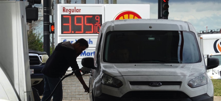 A person purchases gas at a Shell station on September 12, 2022, in Bensenville, Illinois.