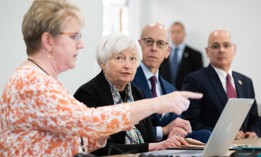 Treasury Secretary Janet Yellen (center) tours an IRS technology workspace in Lanham, Maryland.