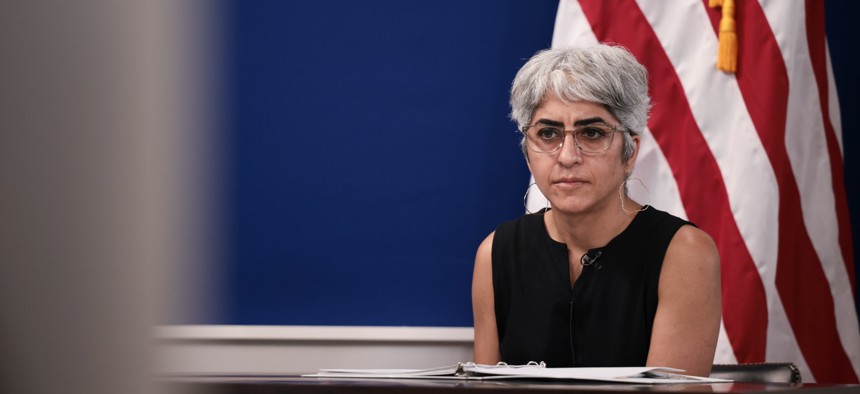 OPM Director Kiran Ahuja, shown here at a White House event held last October, is facing pressure from federal HR officials to match enhanced pay and hiring flexibilities offered by a select few agencies.