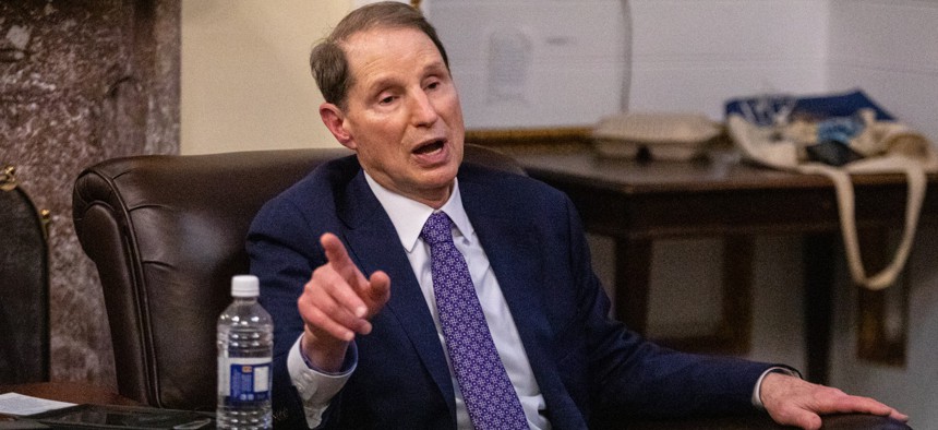 Sen. Ron Wyden (D-OR) speaks to members of the press in the Senate Press Gallery on August 6, 2022.
