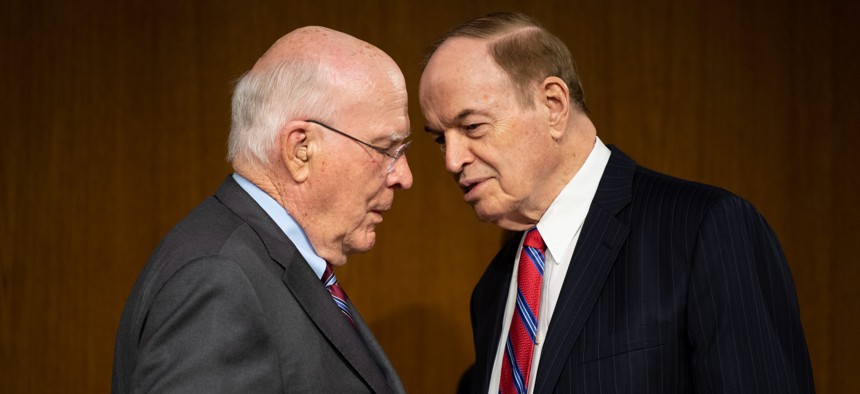 Chairman Sen. Patrick Leahy (D-Vt.) and Vice Chairman Richard Shelby (R-Ala.) confer before the start of a June 2021 Senate Appropriations Committee hearing.