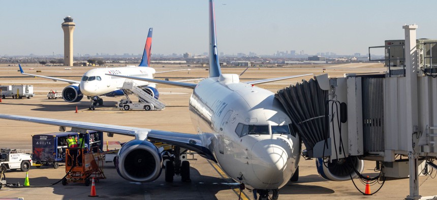 Delayed flights prepare to depart from Dallas-Fort Worth International Airport on Jan. 11, 2023 after systems recovered from an outage that grounded flights nationwide.